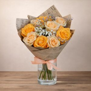 Bukiet róż w kolorze pomarańczowo kremowym w kryzie florystycznej "Uroczy uśmiech"